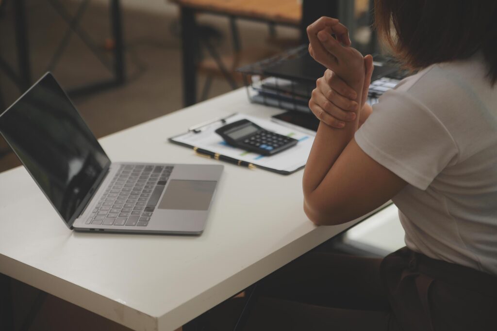 Shot of a asian young business Female working on laptop in her workstation. Stock Free