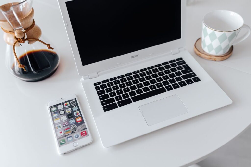 Workplace with laptop on table at home Stock Free