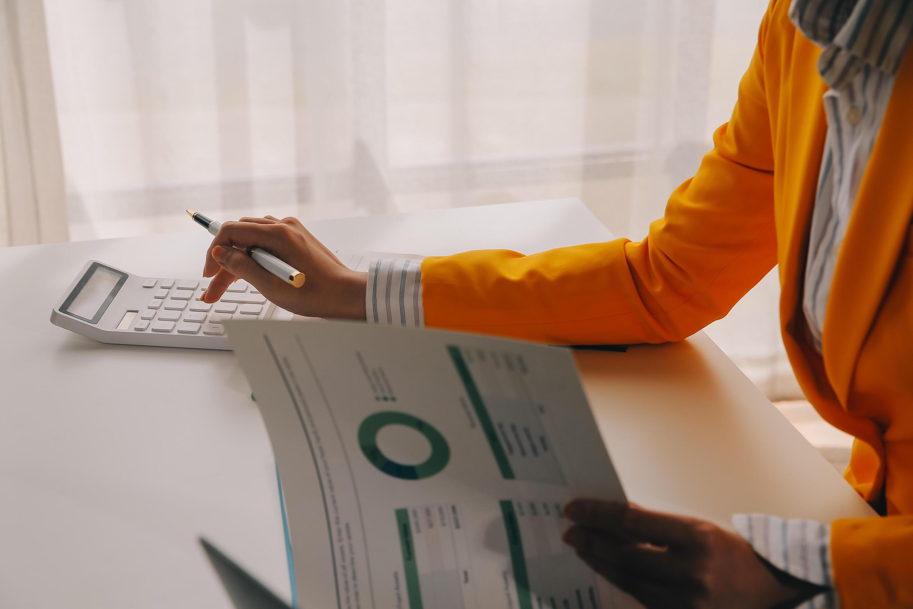 Cropped image of young asian businesswoman working on laptop computer at office. Business lifestyle, successful business concept. Stock Free