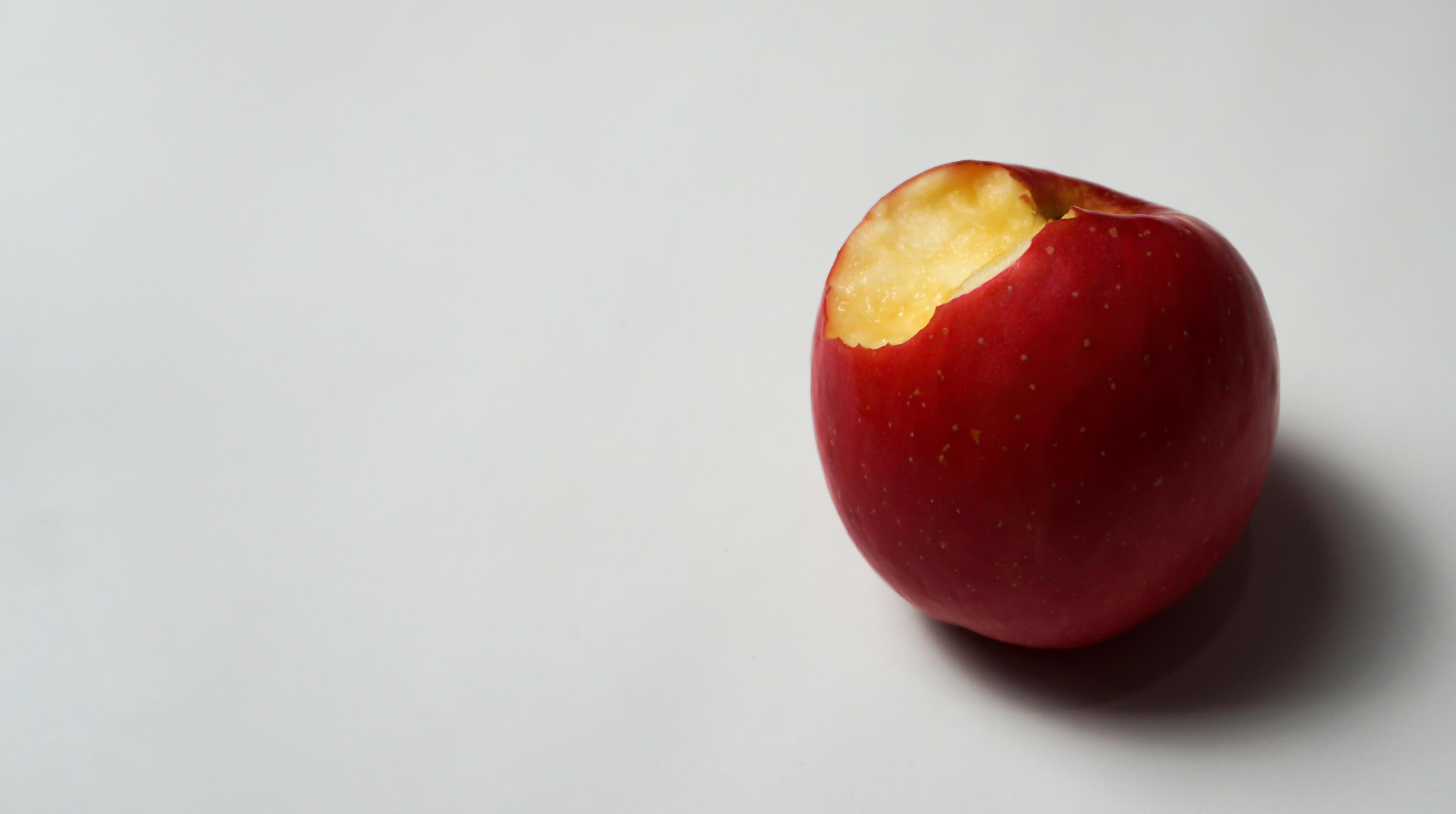 Bite apple on a white background Stock Free