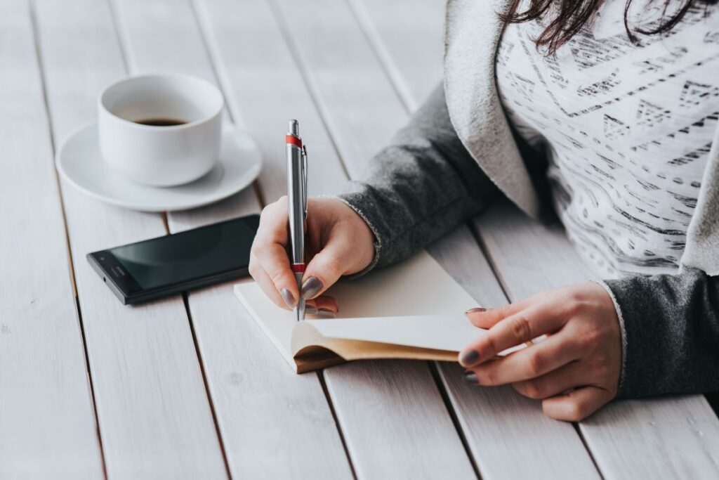 Coffee on a table with other items Stock Free