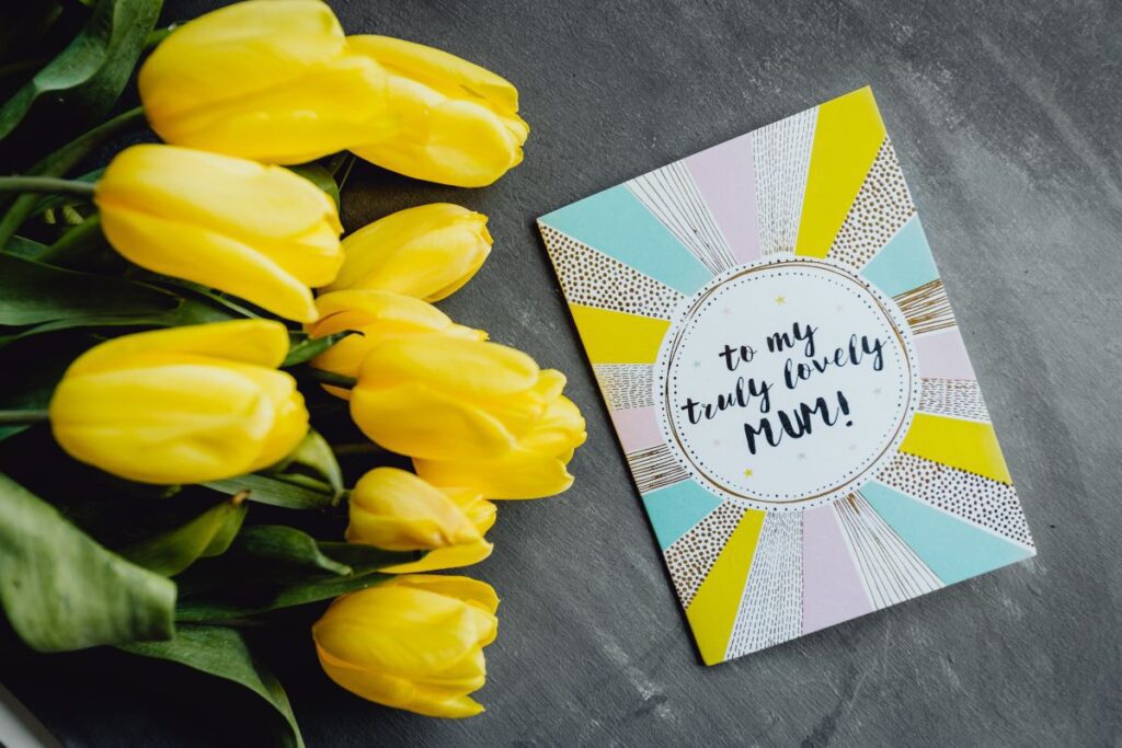 Mother`s Day card with colorful tulip flowers Stock Free