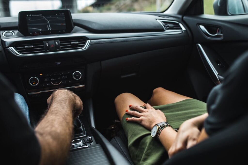 Couple travelling by car Stock Free