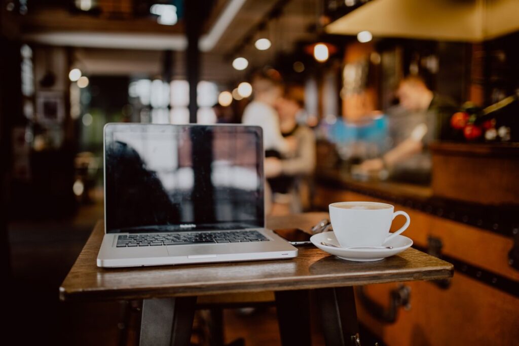 Cup of coffee on table in cafe Stock Free