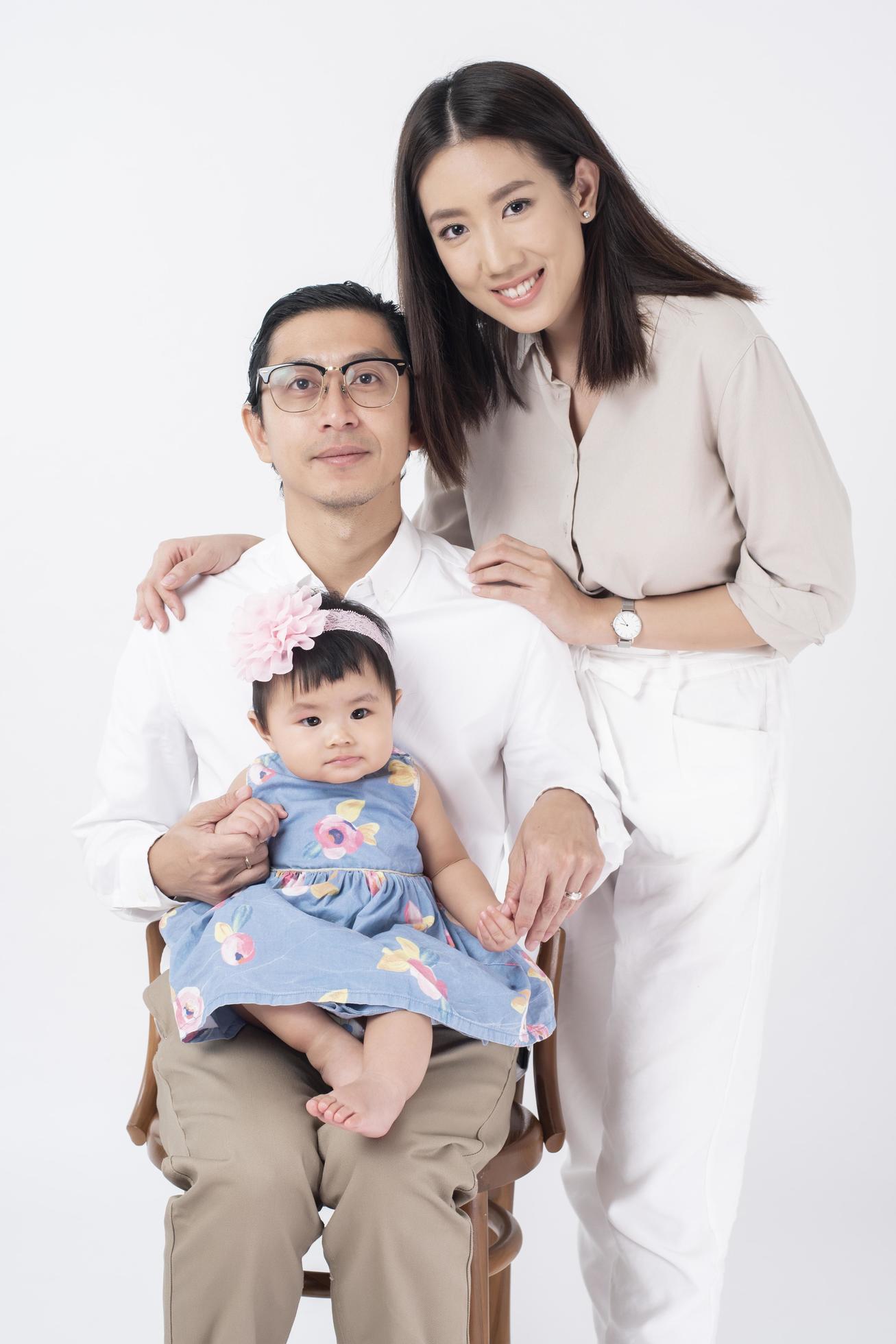 Happy Asian family on white background Stock Free