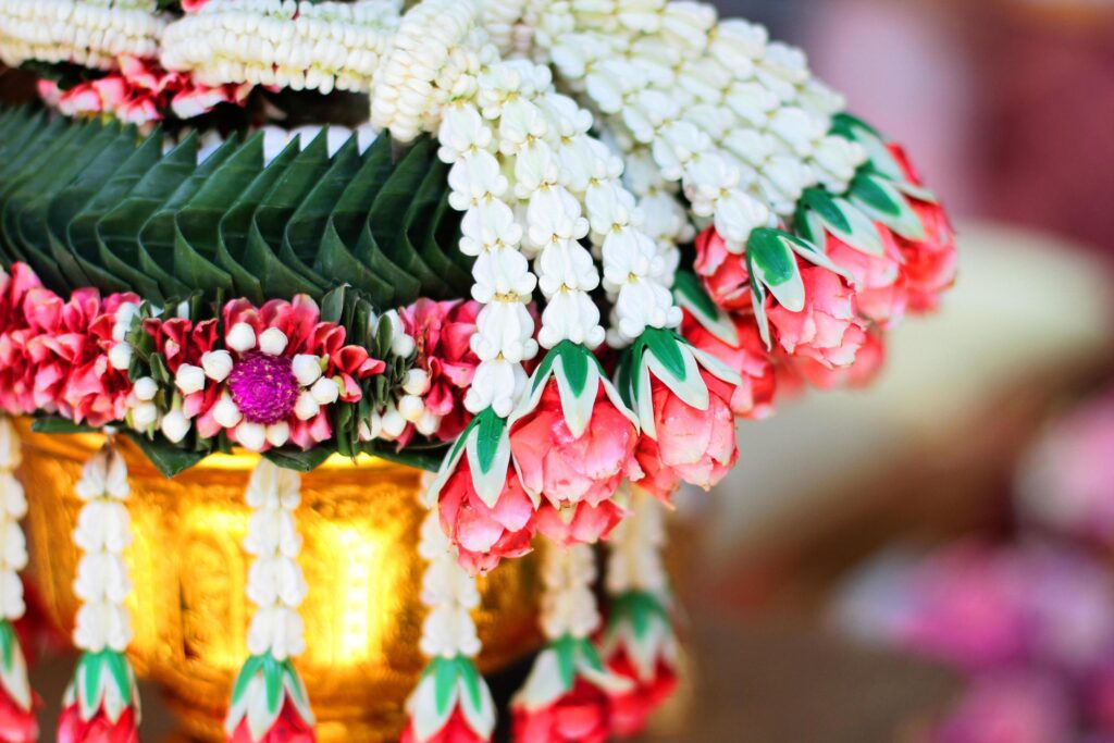 Flower garlands on a gold tray in tradition Thai wedding ceremony day. Jasmine garland. Stock Free