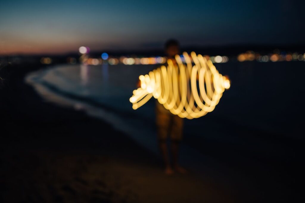 Light painting on the beach at nigh Stock Free