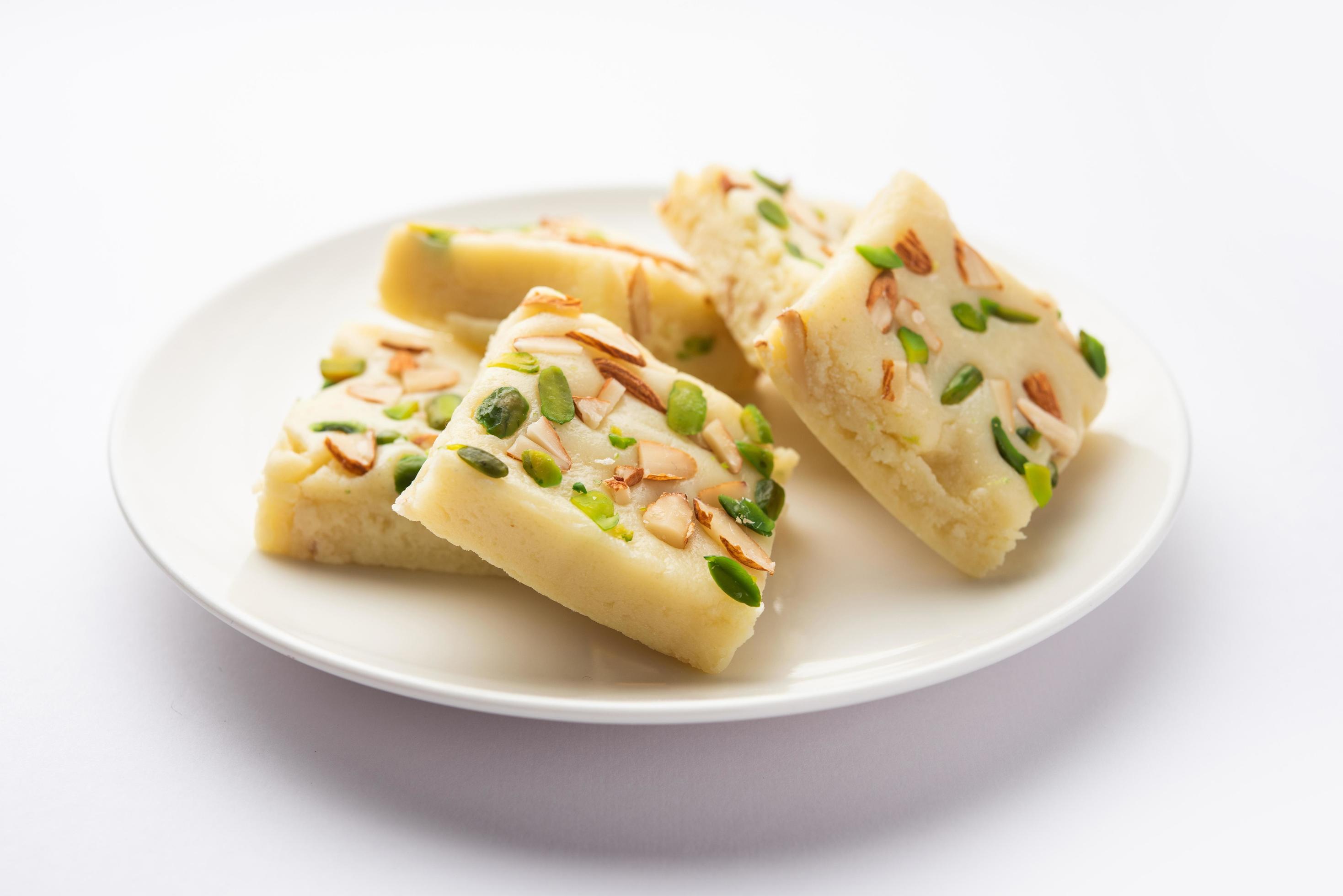 Milk powder barfi also known as Mava burfi, white Khoya burfi or Barfee, Indian Sweet food Stock Free