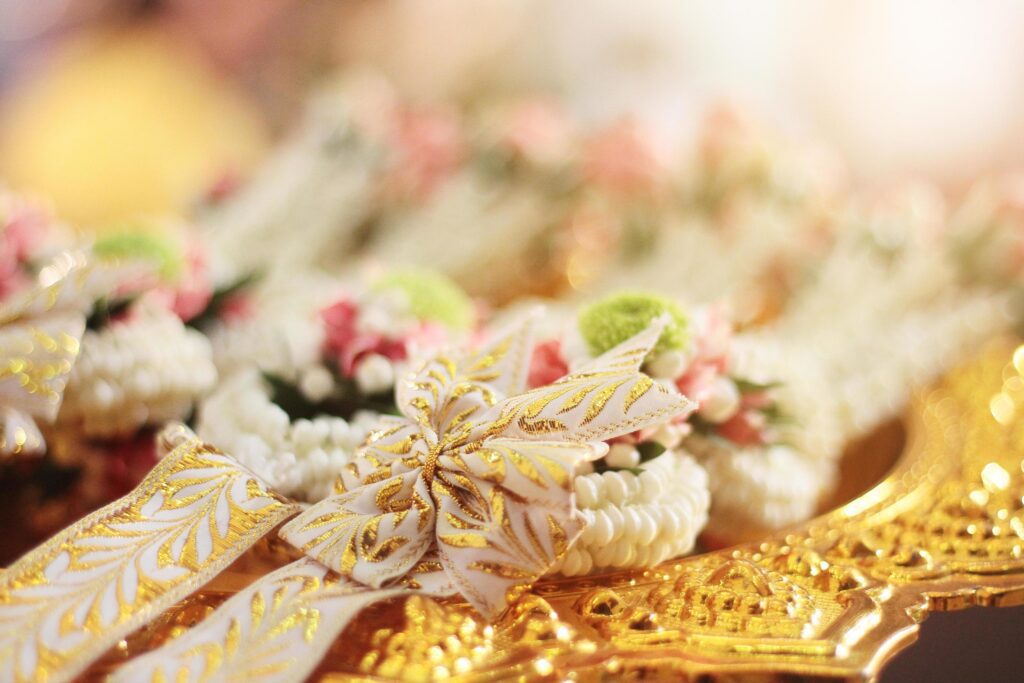 Flower garlands on a gold tray in tradition Thai wedding ceremony day. Jasmine garland. Stock Free