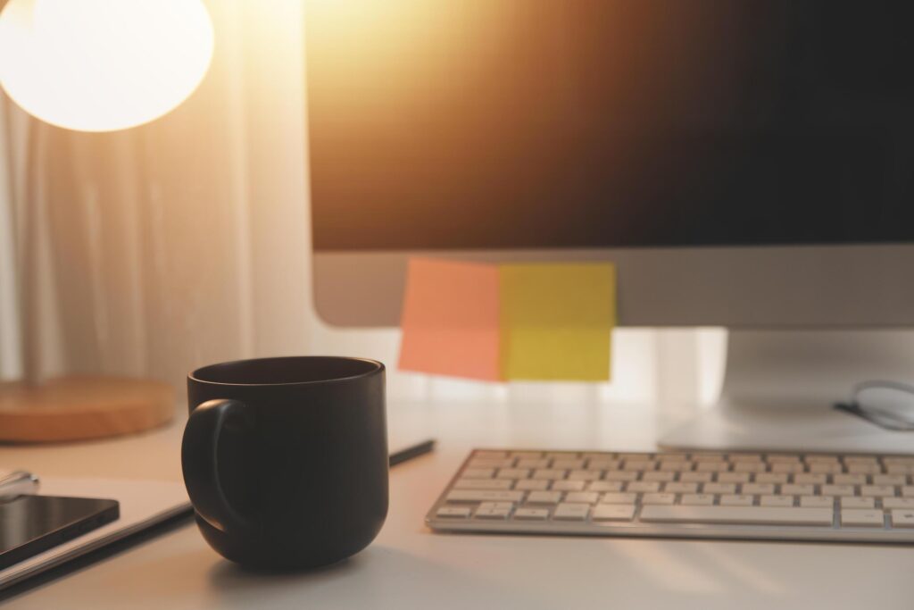 messy office workspace. Messy and cluttered office desk. Messy business office with piles of files and disorganized clutter. Stock Free