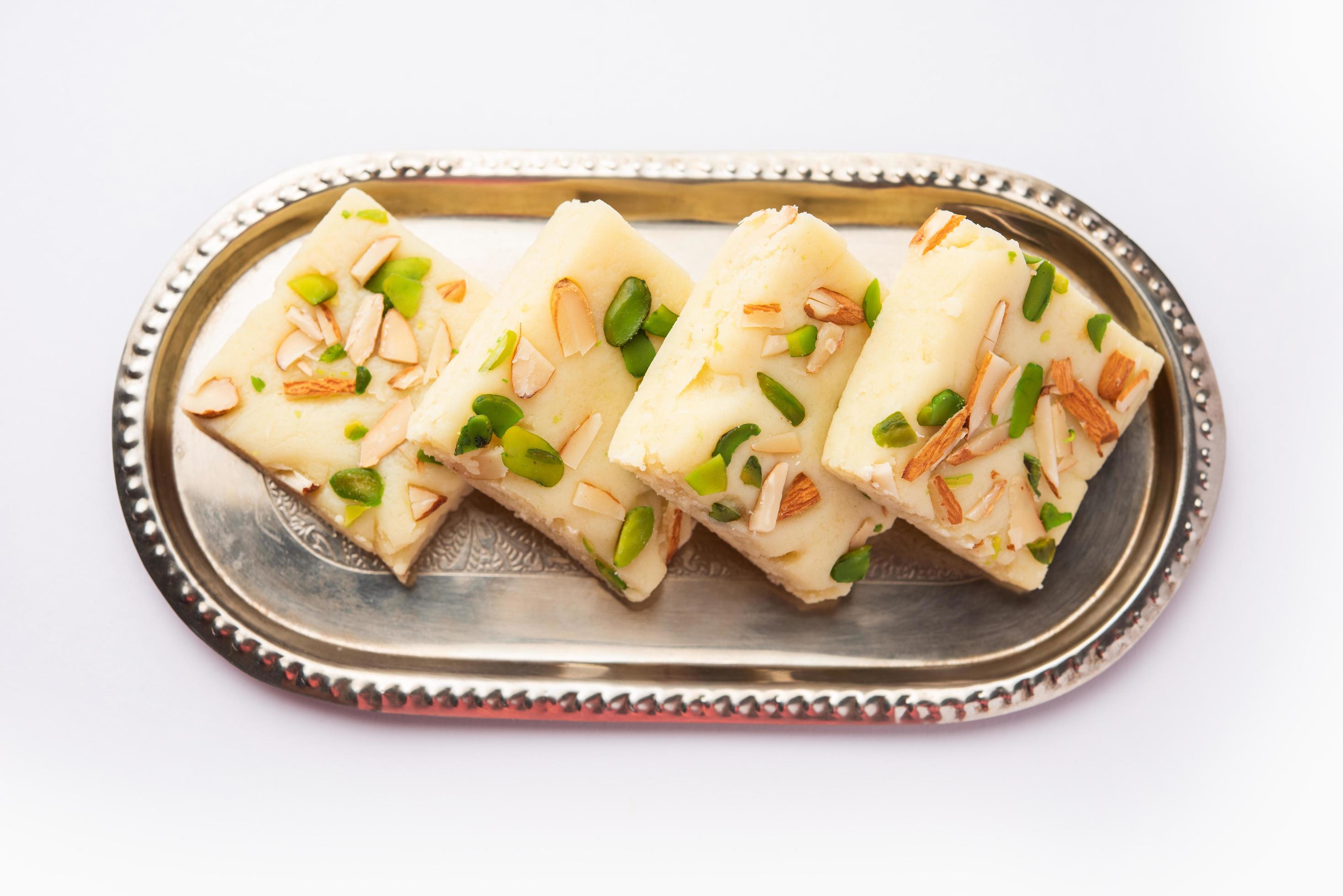 Milk powder barfi also known as Mava burfi, white Khoya burfi or Barfee, Indian Sweet food Stock Free