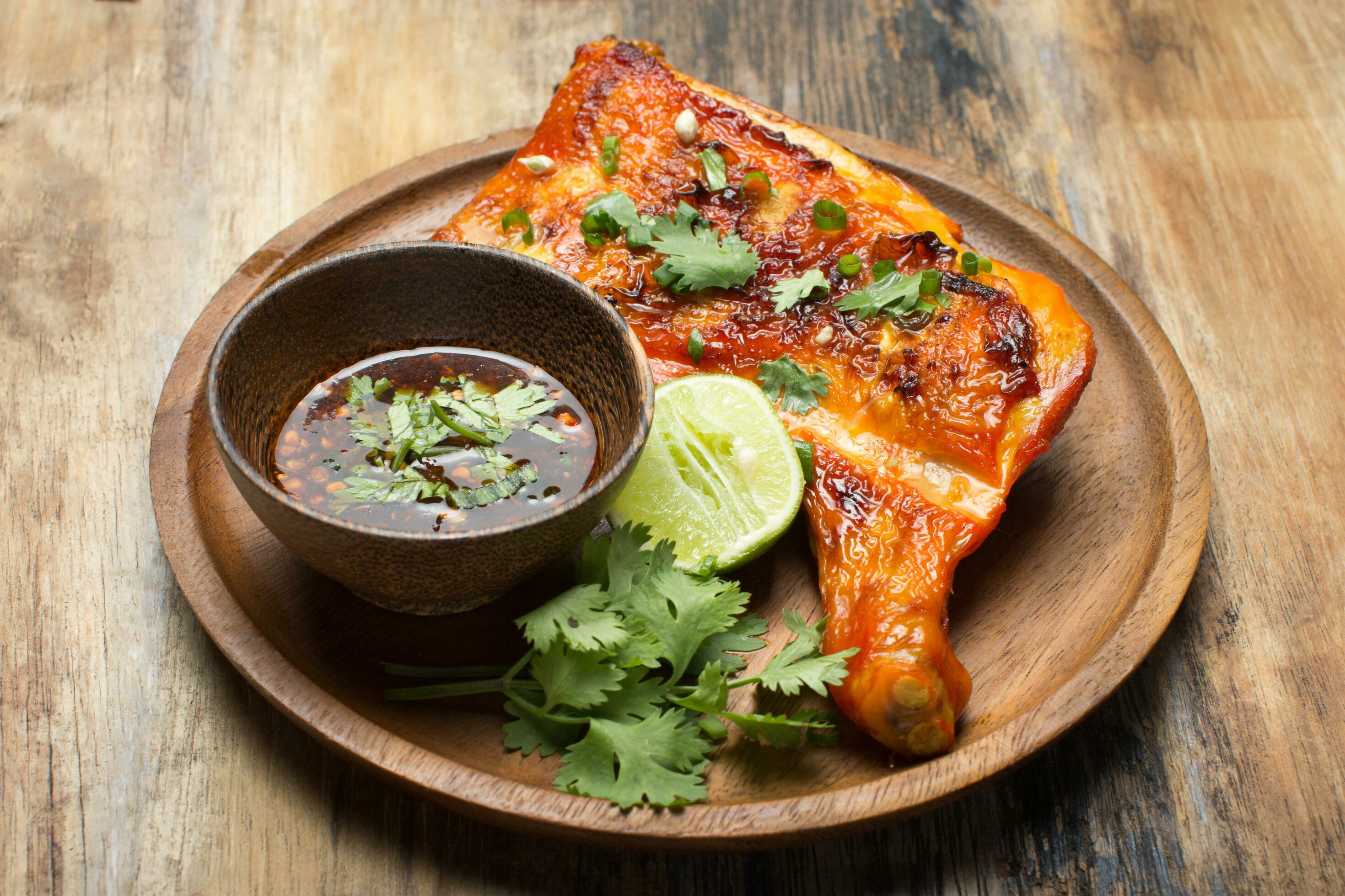 Grilled chicken with spicy Thai-style sauce, Local food of thailand Stock Free