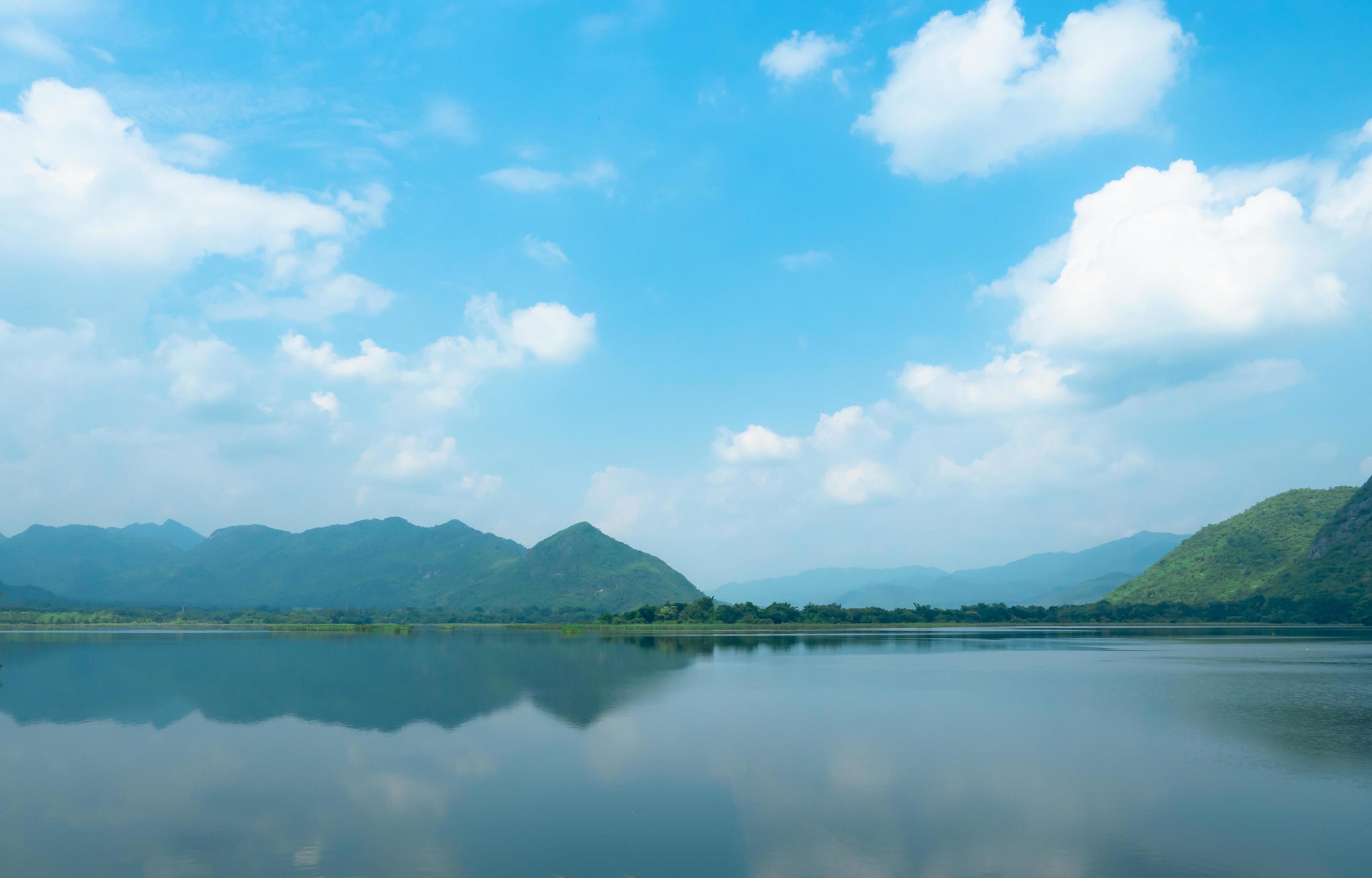 River and mountain with blue sky white cloudy view landscape beautiful nature and Valley reflection in the river Stock Free