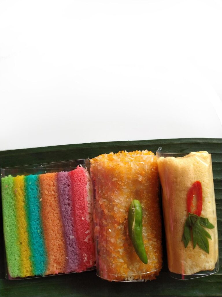 Assorted colorful Indonesian traditional cakes isolated on white background. Stock Free