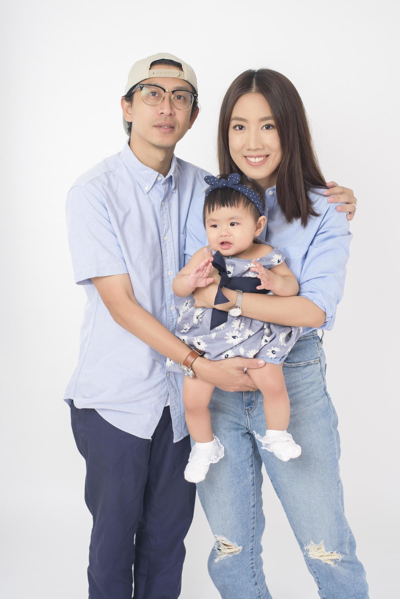 Happy Asian family on white background Stock Free