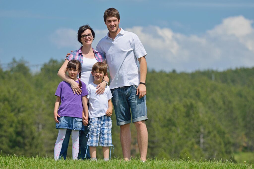 happy young family have fun outdoors Stock Free