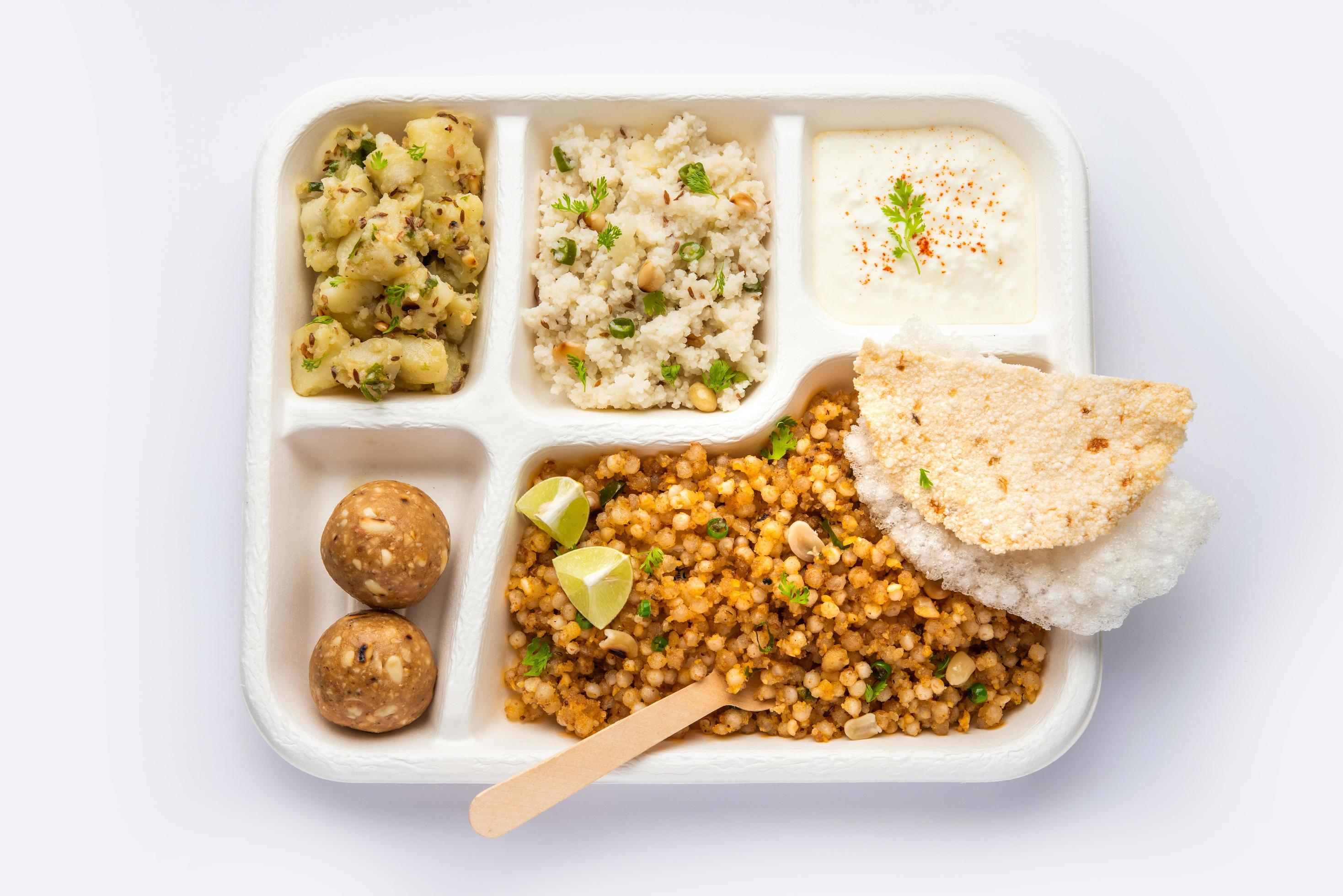 Indian Upwas thali, fasting food platter or thali for home delivery or takeaway parcel for any Vrat Stock Free