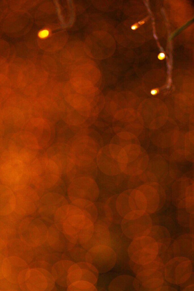 Bokeh lights background. Abstract multicolored light.Christmas concept. Stock Free