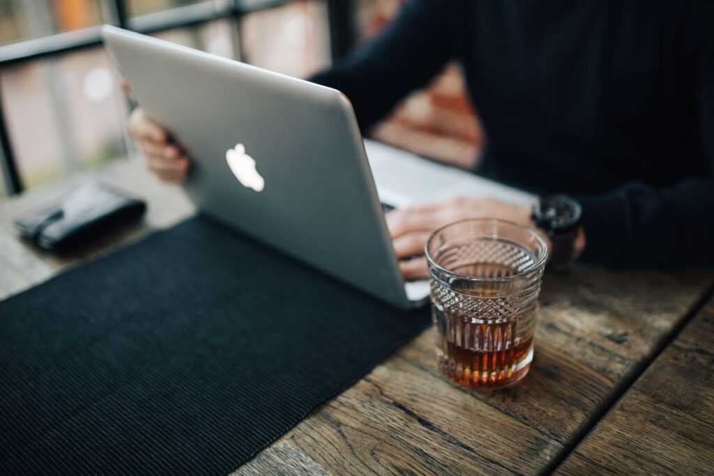 Young Entrepreneur Working from a Modern Cafe Stock Free