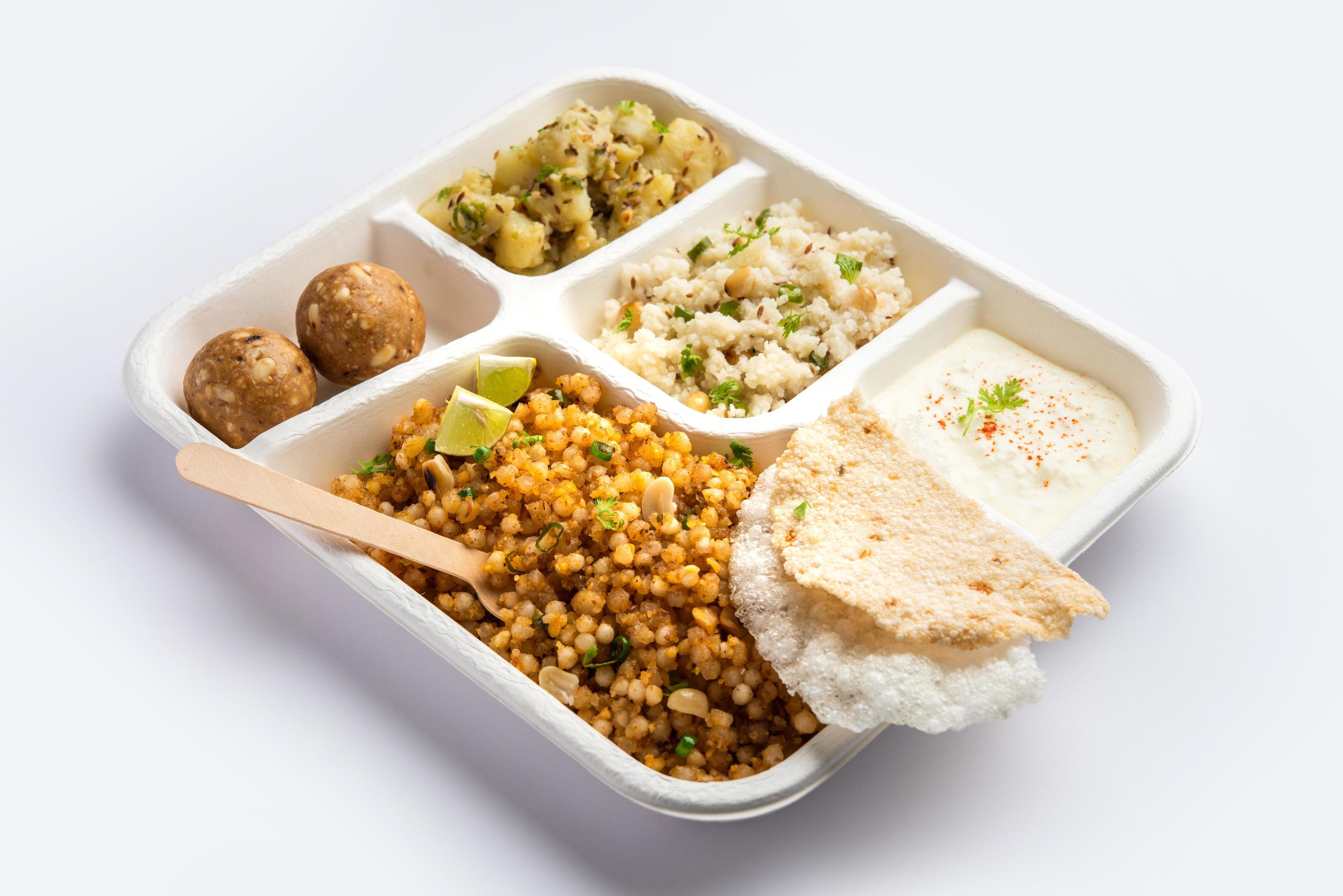 Indian Upwas thali, fasting food platter or thali for home delivery or takeaway parcel for any Vrat Stock Free