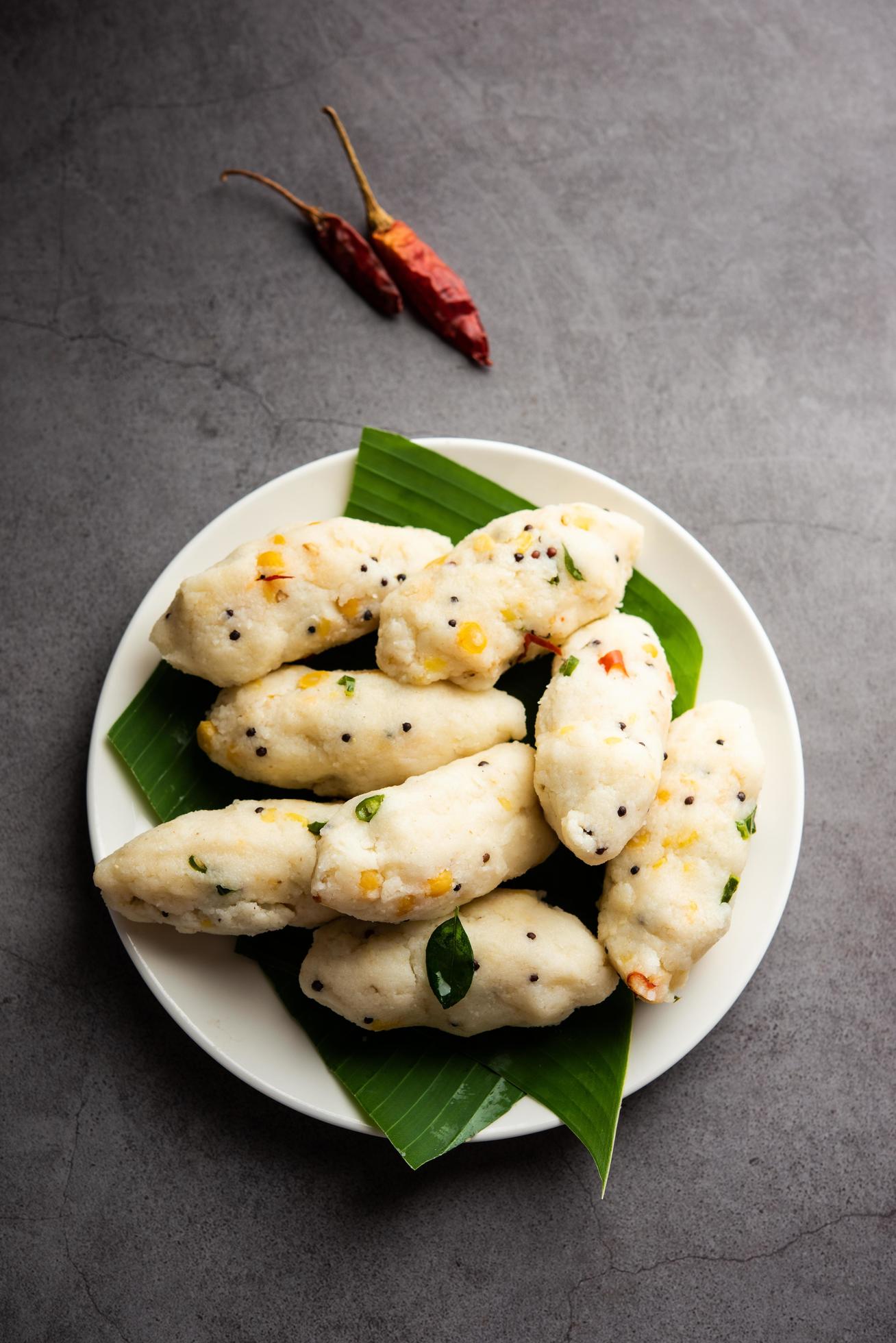 Kozhukatta Pidi is a steamed snack food from kerala rice flour with finger impressions Stock Free