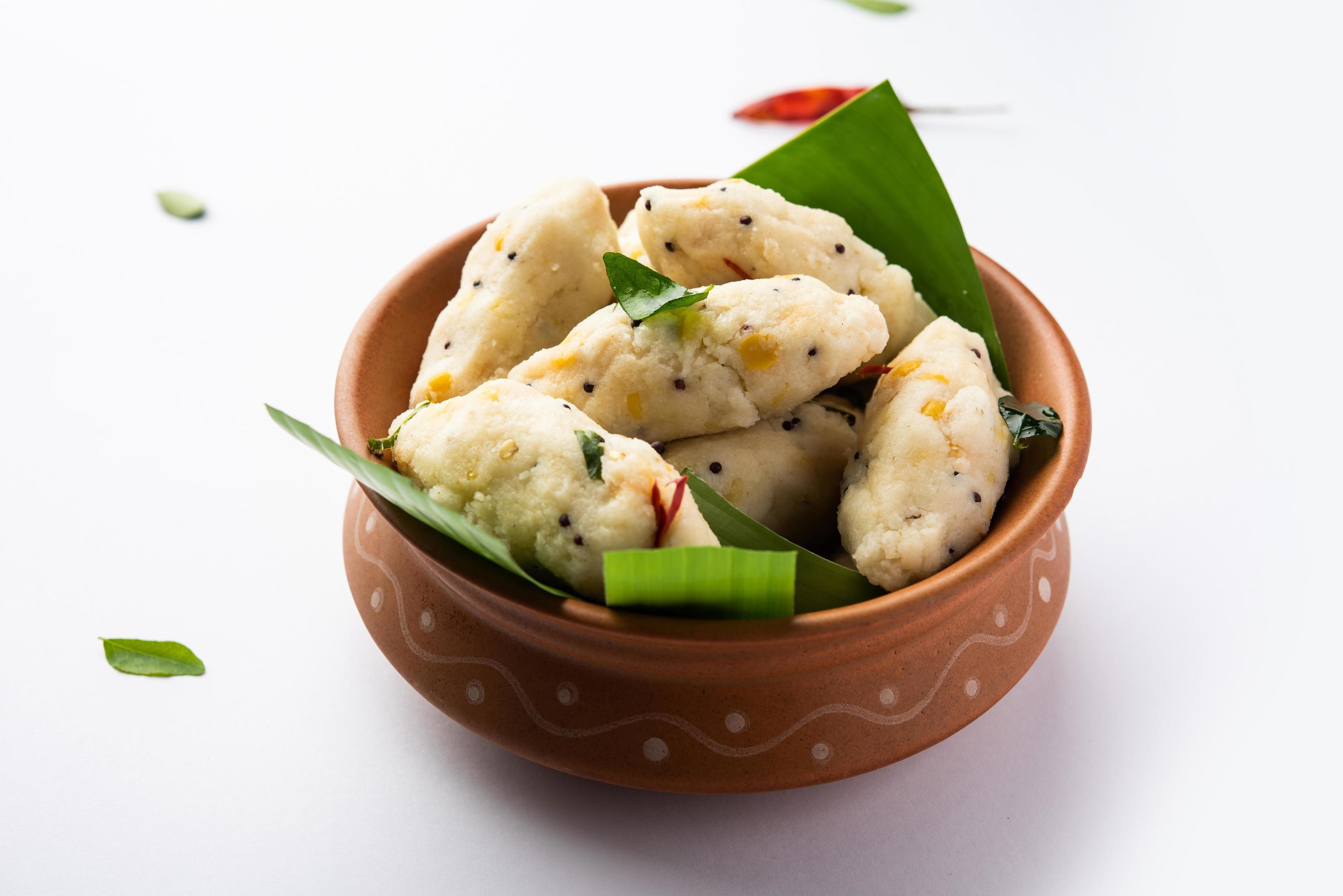 Kozhukatta Pidi is a steamed snack food from kerala rice flour with finger impressions Stock Free