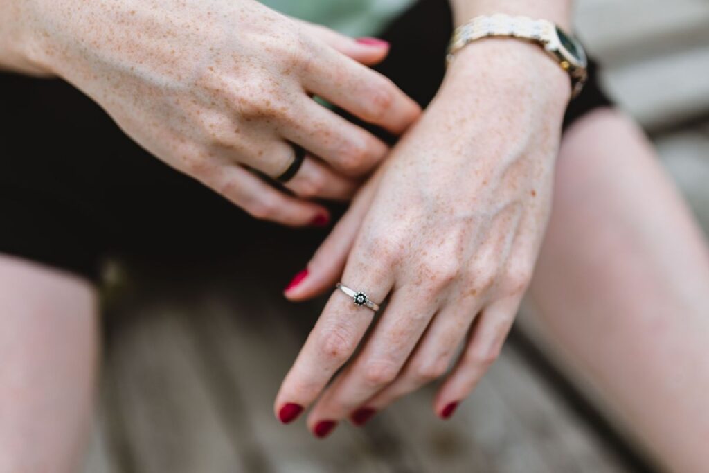 Detail of woman’s hands and jewelry Stock Free