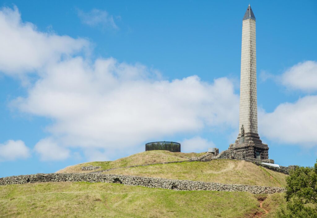 The Obelisk monument on the top of One Tree Hill in Auckland, New Zealand. Stock Free