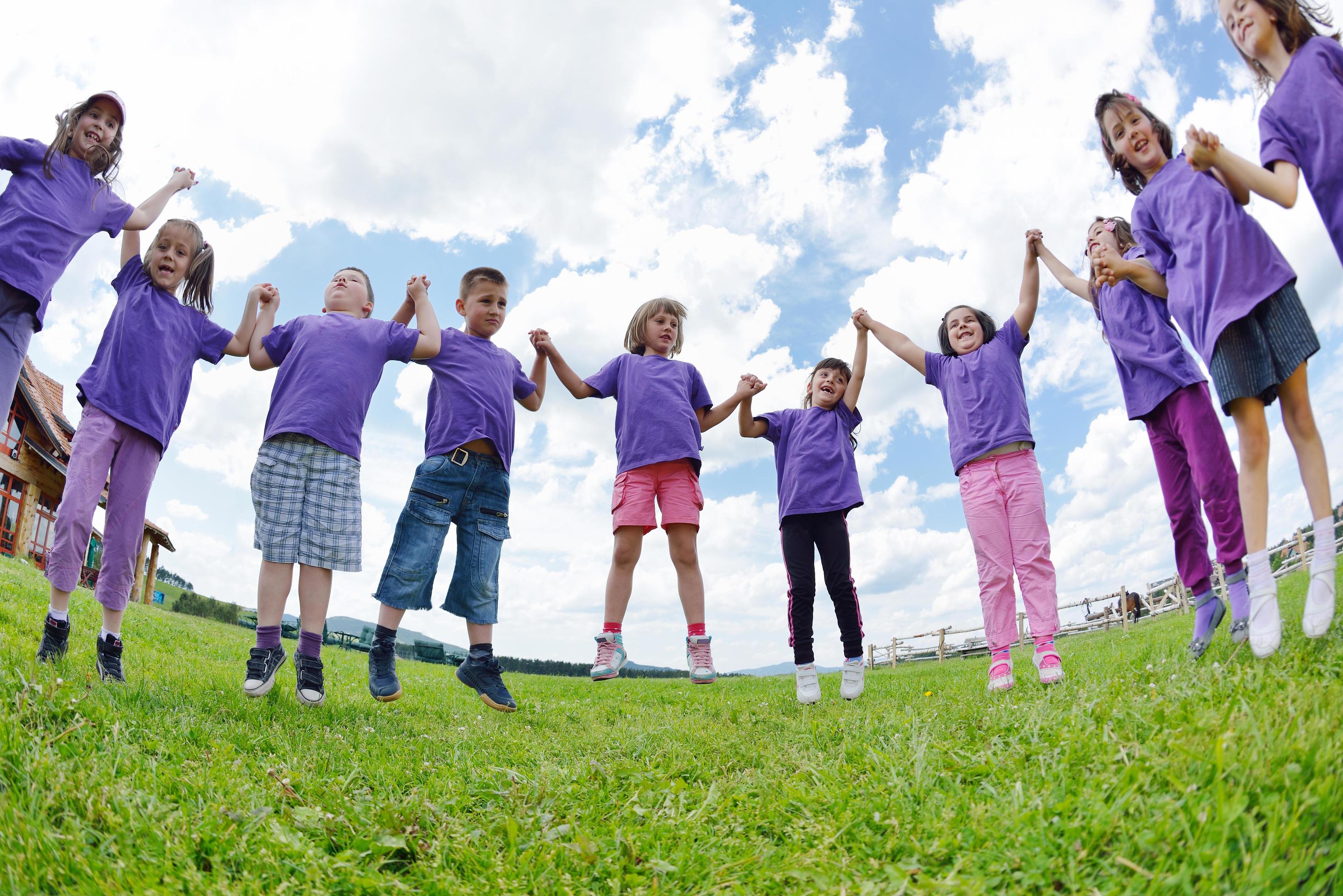 happy kids group have fun in nature Stock Free