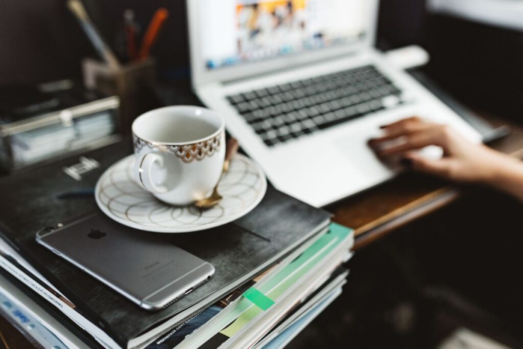 Woman working on laptop at home office Stock Free