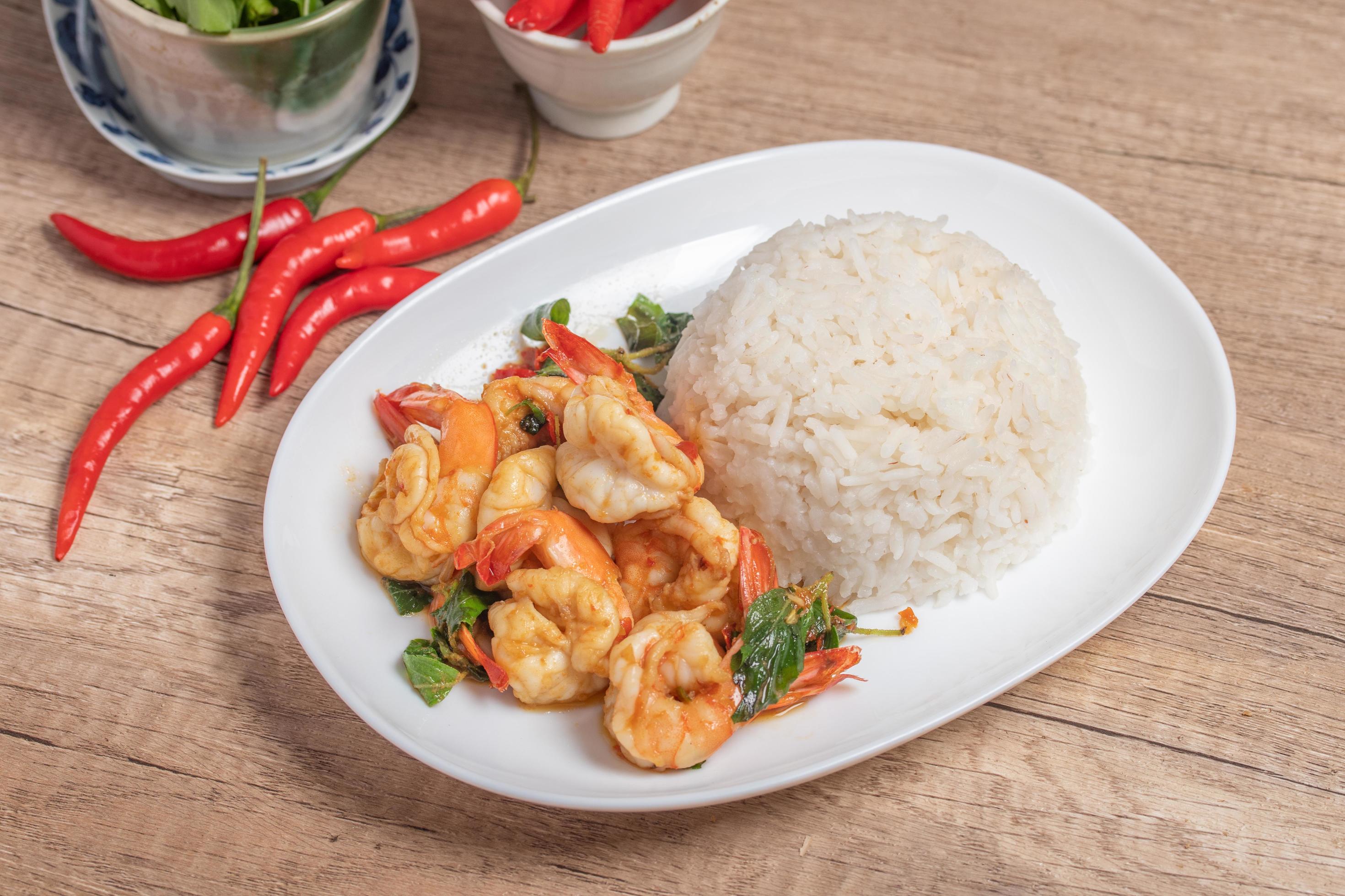 Shrimp basil with steamed rice.Thai spicy food.Street food Stock Free