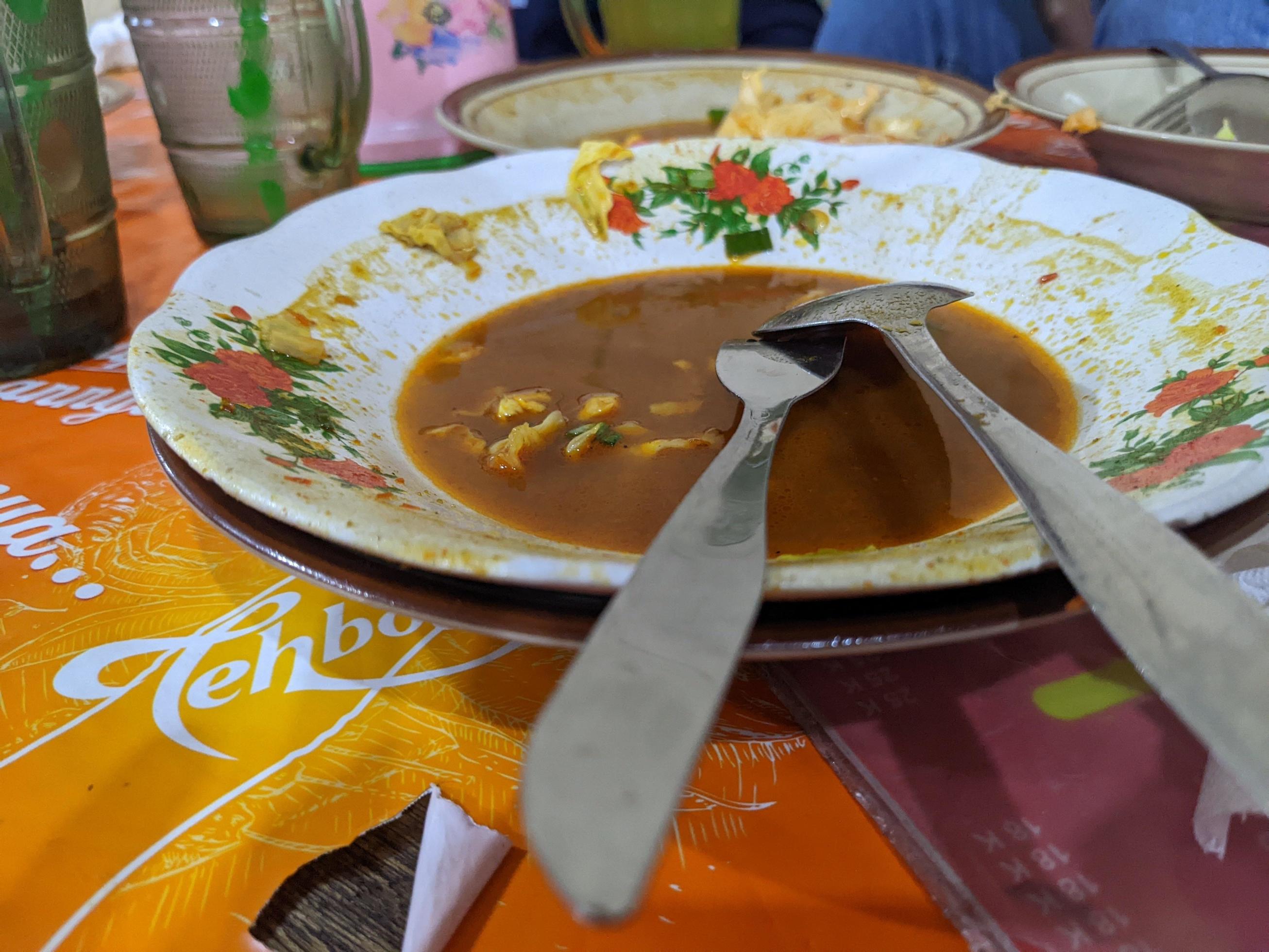 Plate and bowl after finish dinner on the traditional restaurant. The photo is suitable to use for food background, poster and food content media. Stock Free