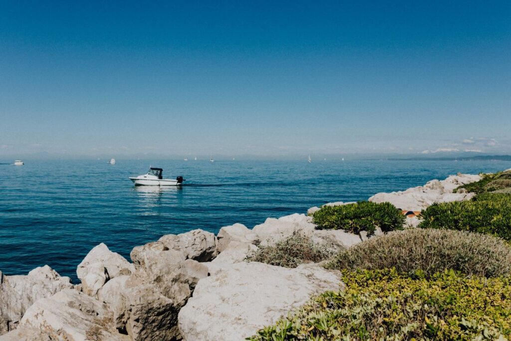 View from the rocky coast at the Adriatic Sea in the town of Izola, Slovenia Stock Free