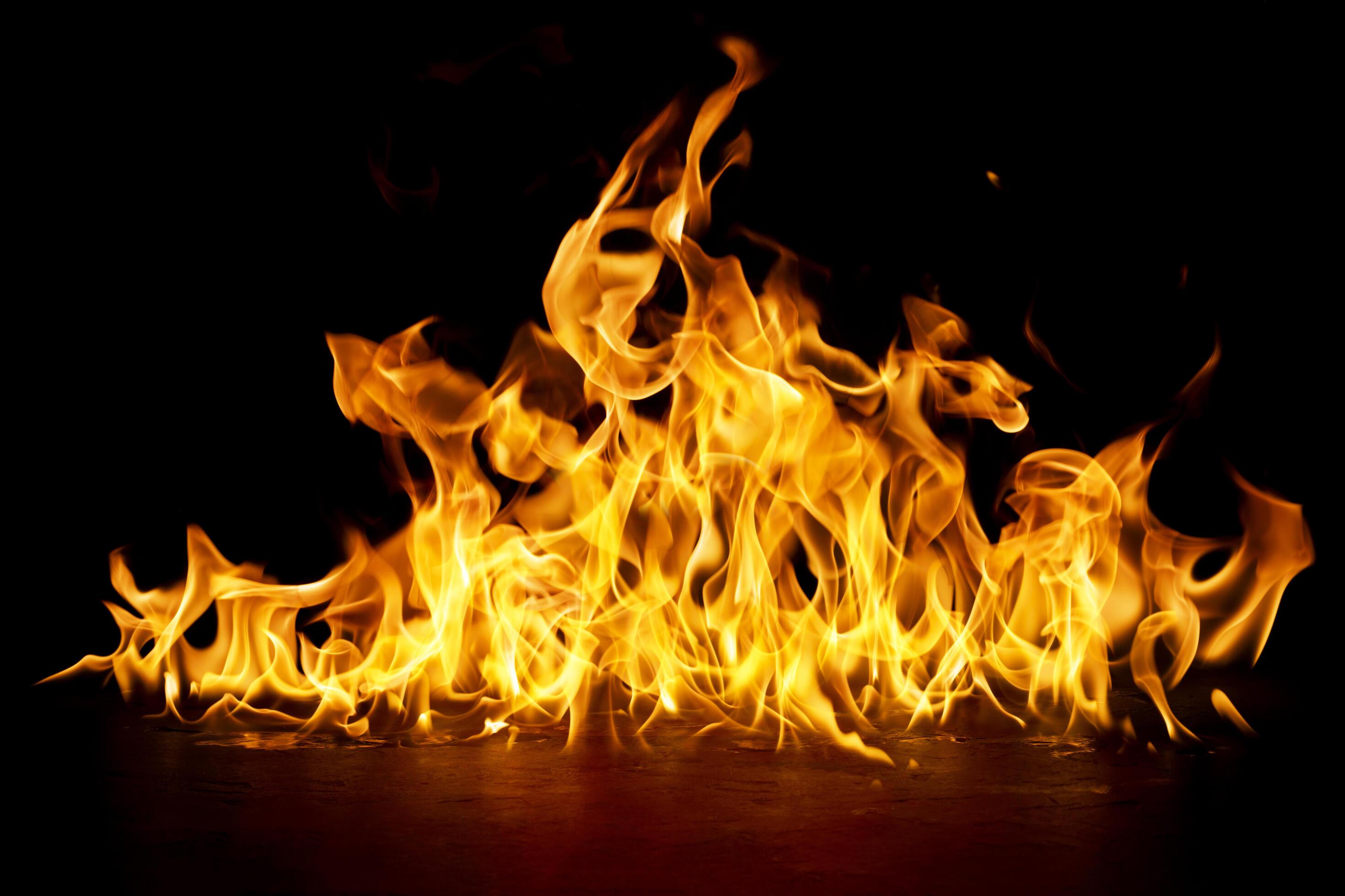 fire burning flame Isolated on a black background Stock Free