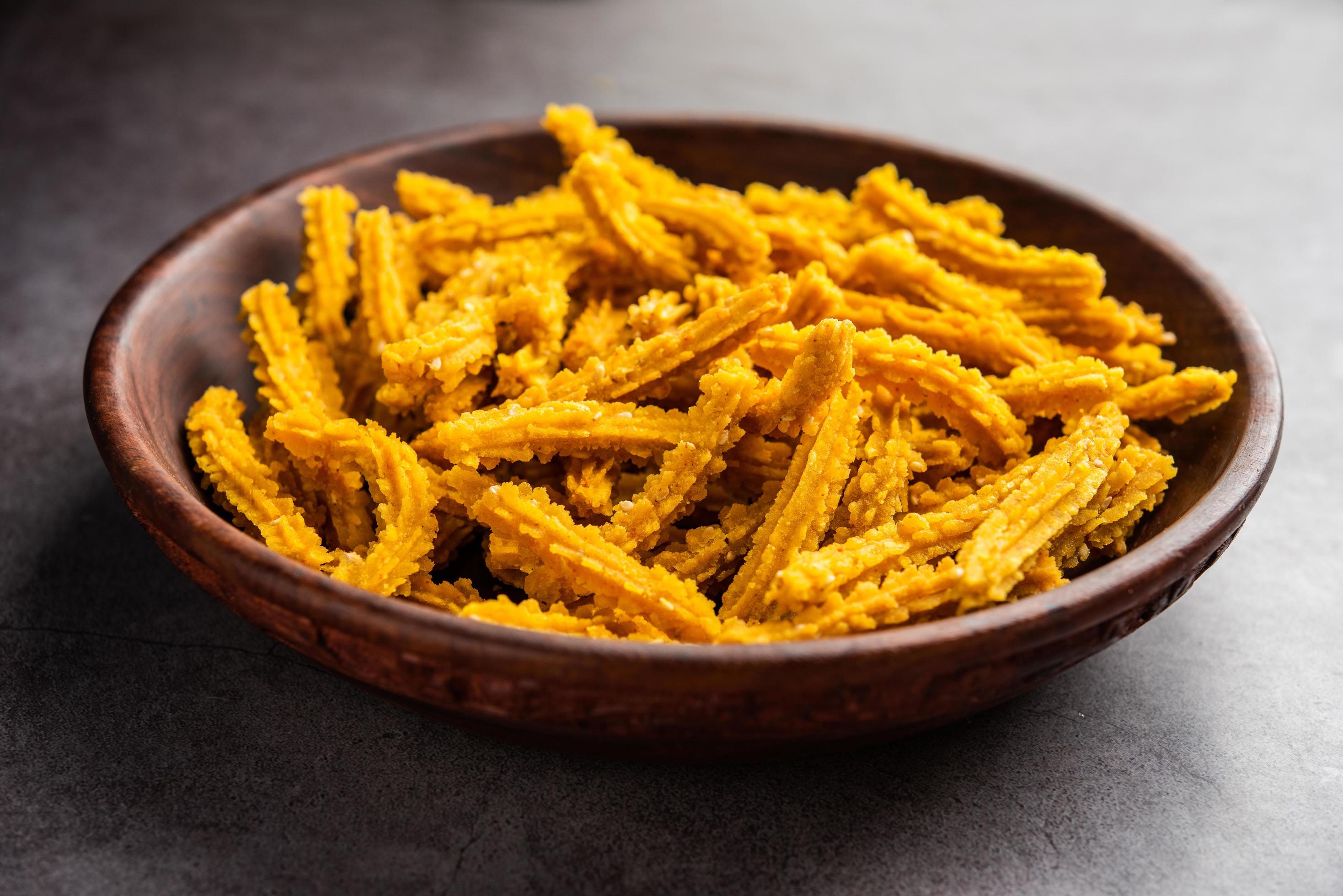 Bhajni chakli sticks or crunchy murukku snack made using diwali festival, favourite munching food Stock Free