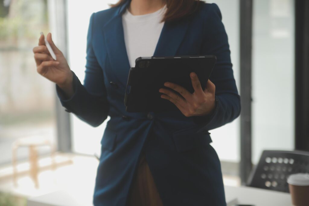 Shot of a asian young business Female working on laptop in her workstation. Stock Free