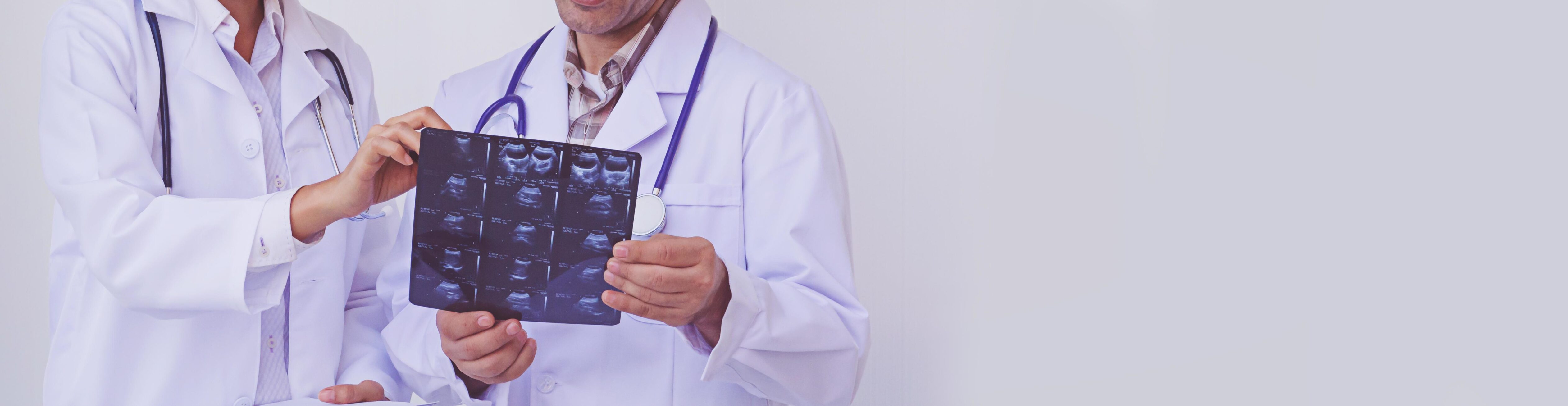 Doctors holding a clipboard with prescription Stock Free