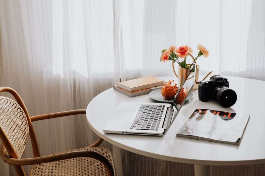 A woman works on a laptop at home Stock Free