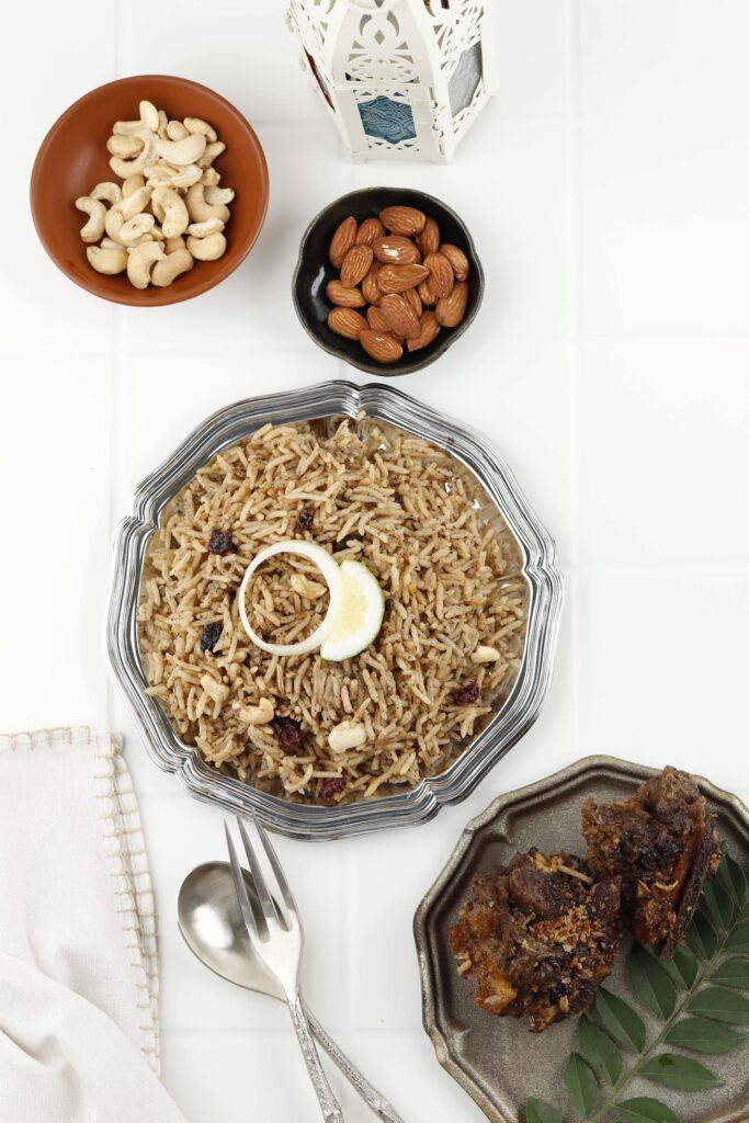 Arabic Traditional Rustic Rice Food Pilaf Cooked with Fried Ribs Meat, Onion, Raisin, and Garlic Stock Free