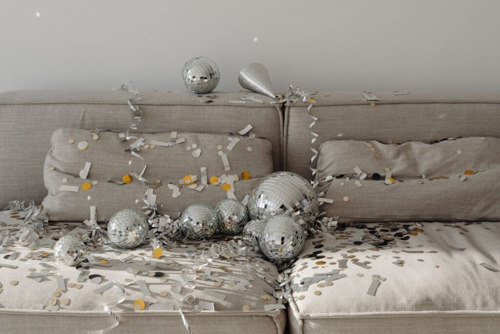 New Year’s Eve party mess – confetti – disco balls Stock Free