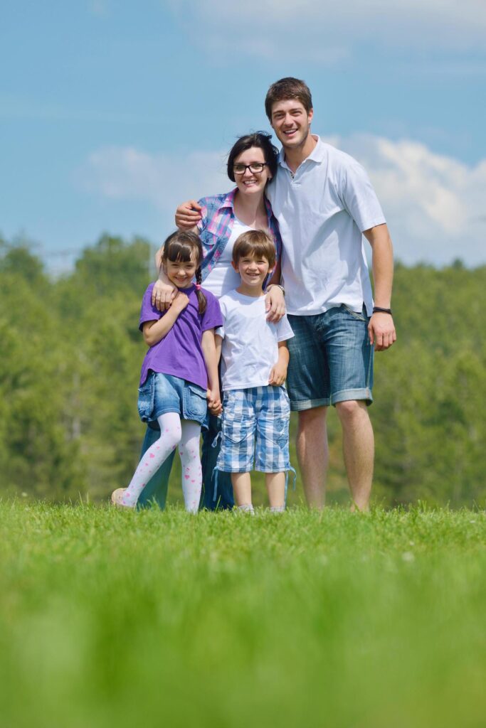 happy young family have fun outdoors Stock Free