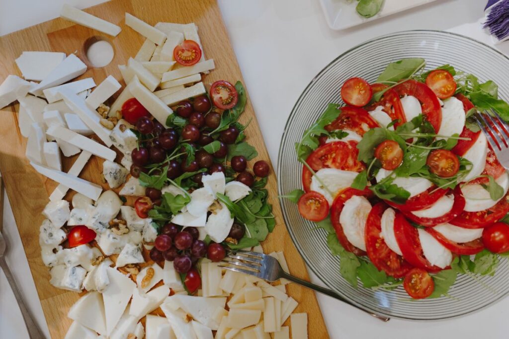 Catering banquet table with different food snacks and appetizers Stock Free