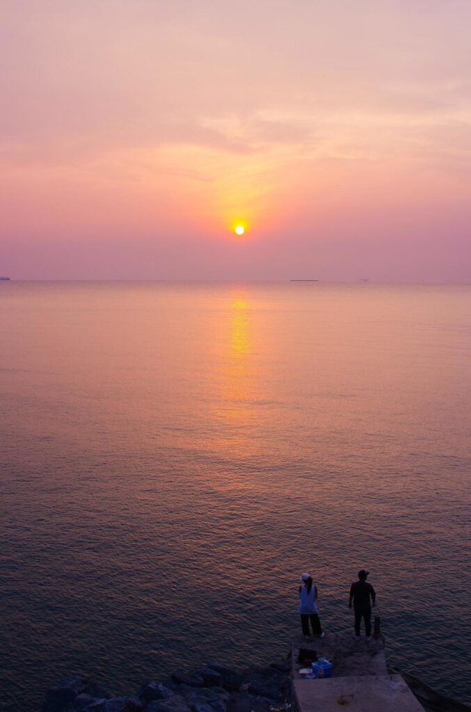 Peoples in the island and beautiful sea view. Sunset at the island, romantic background concept. Stock Free