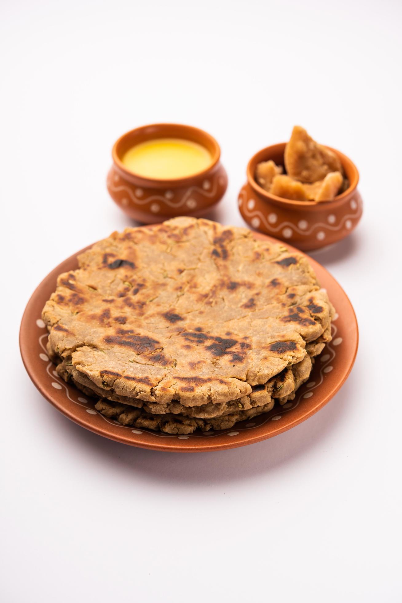 Sweet roti made out of rice flour, jaggery, and ghee. Gud ki roti. gur ki roti, jaggery Bhakri, meethi gud ki roti. Winter food. Copy space. Stock Free