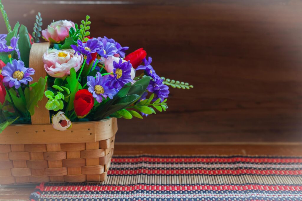 still life flower in basket on old wood Stock Free