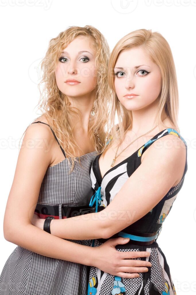 Portrait of two pretty young women Pro Photo