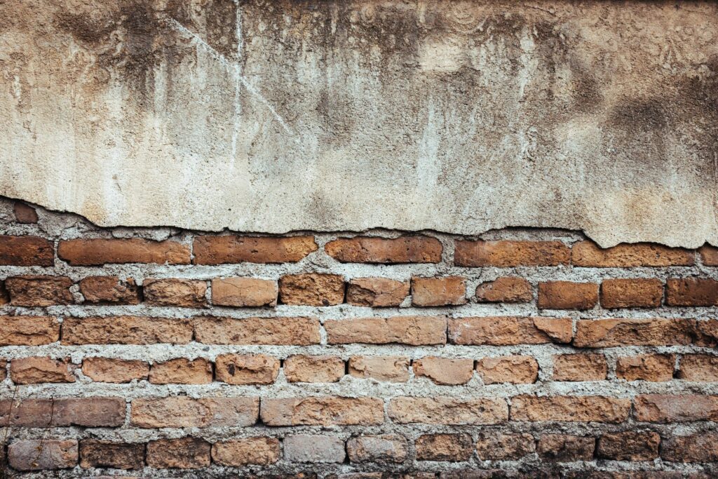 Brick grunge wall background and texture Stock Free