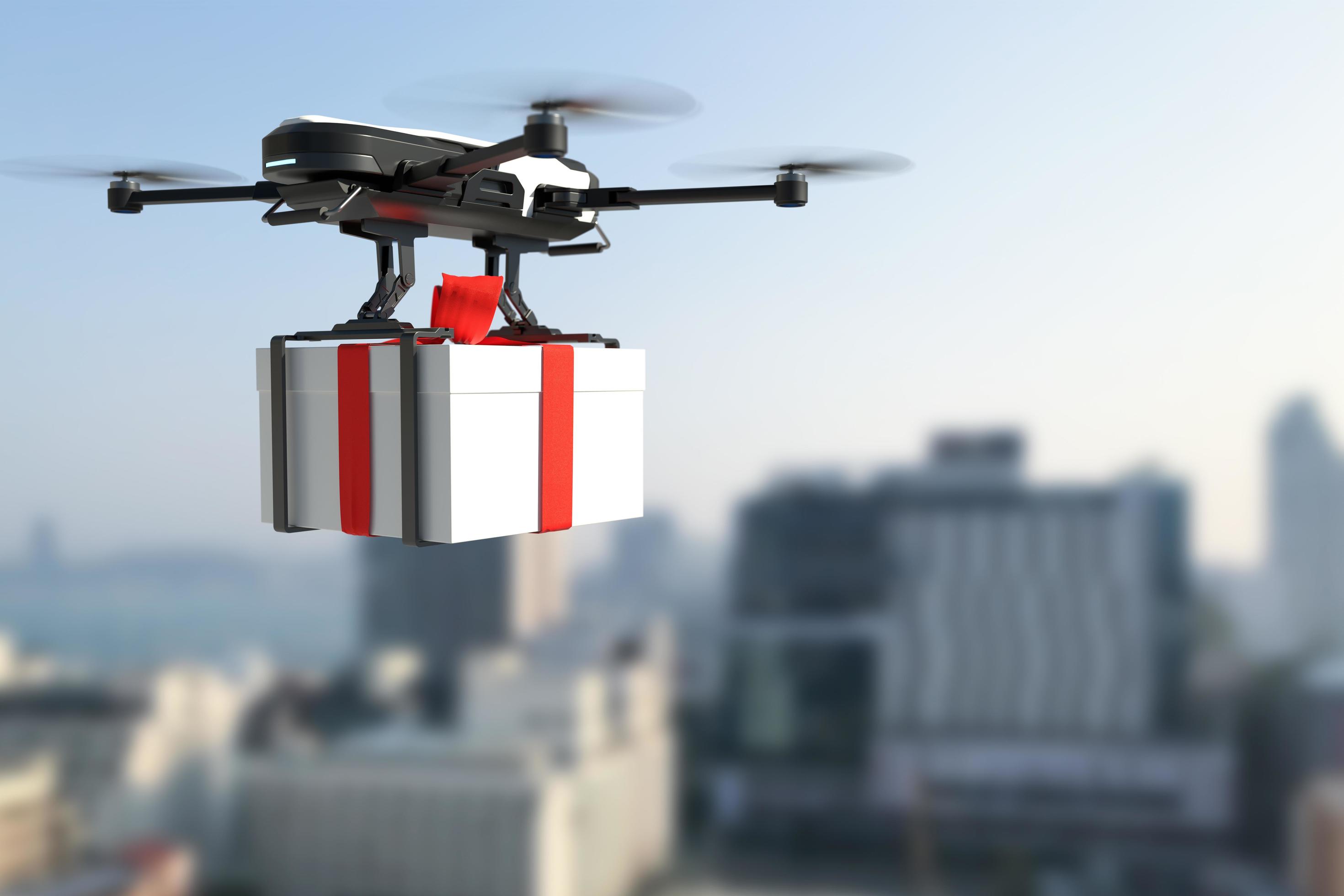 Drone delivery gift boxes, Autonomous delivery robot, Business air transportation concept. Stock Free