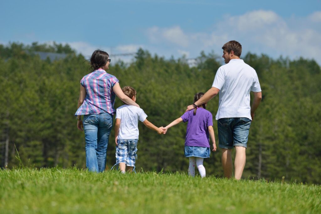 happy young family have fun outdoors Stock Free