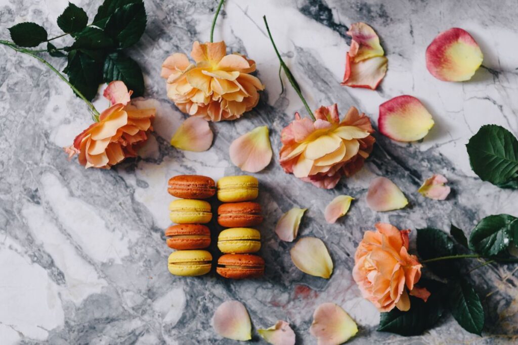 Overhead view of macarons on a marble slab Stock Free